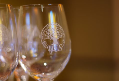 Wine glasses with Yamhill Enrichment Society - YES logo on them